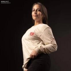 Women's Heart And Soul Of A Warrior Long Sleeve - Sand -Fashion Trend Clothing Store Model Info Poster 2000x2000 GS5840HeartandSoulofaWarriorLS Sand